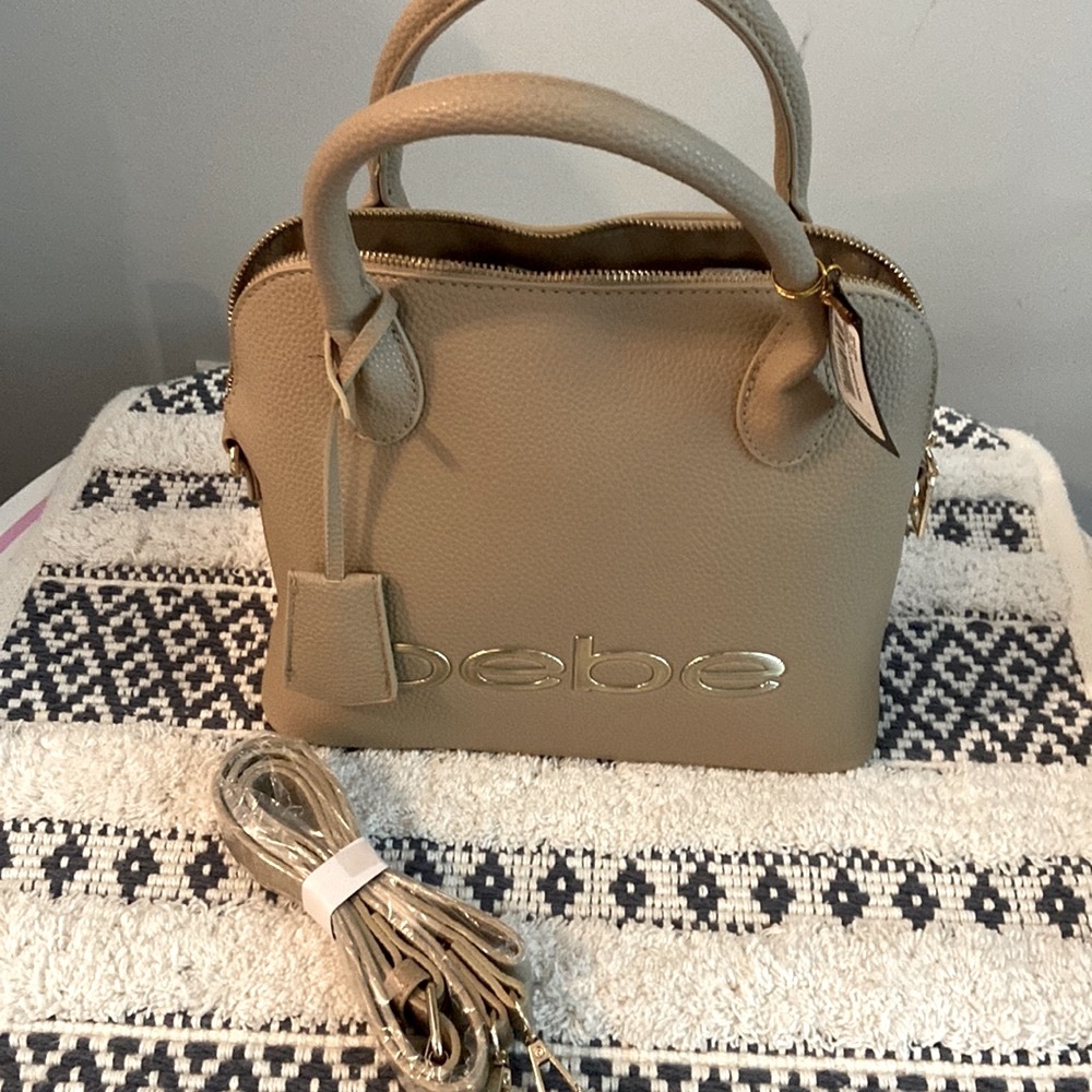 New Bebe hand bag, shoulder bag or Crossbody!  You choose. MSRP $88